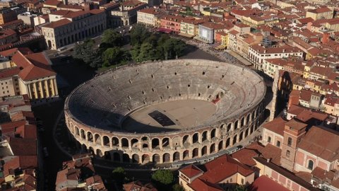 Aerial view of Verona city center, Italy. Point of interest at the Arena of Verona. City panoramic landscape. Aerial drone panoramic video from iconic city of Verona. 