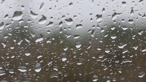 rain drops falling on the car windscreen 1080p clip