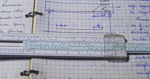 VINTAGE SLIDE RULE. Old school calculating. Make calculations on a logarithmic ruler.