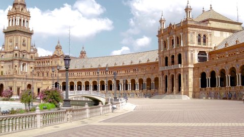 Espana Square, in the center of Seville. Pandemic time , with very few tourists. Very touristic travel destination empty due to coronavirus measures. Panoramic view over the plaza. Pan left