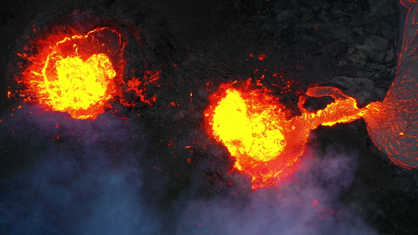 Aerial footage of an eruption looking straight down into the pits