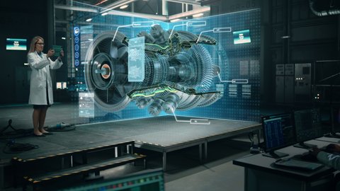 Factory: Engineer Holds Tablet Computer, Designes Engine in Augmented Reality App. Industry 4.0 Concept: Research, Development, Visualization, Digitalization of Green Electric Energy