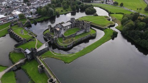 Medieval castle surrounded by moat in Caerphilly, South Wales. Aerial view