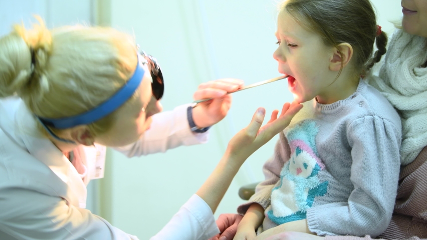 Ear, nose, throat examining. doctor with a child and endoscope. otolaryngology