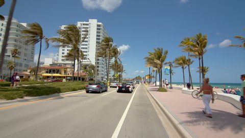 FORT LAUDERDALE, FL, USA - APRIL 4, 2021: 6k video Mclaren Spider British supercar on the streets of Fort Lauderdale FL USA