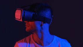 The man getting experience using vr headset glasses