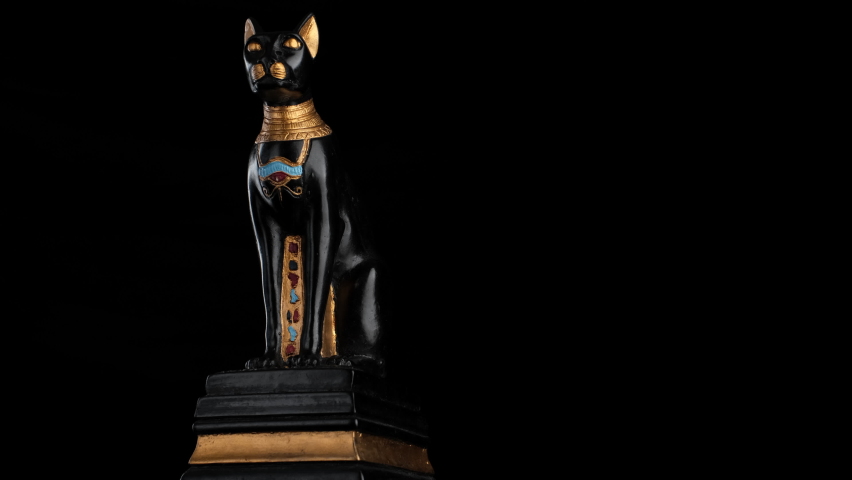 figurine Egyptian cat on black background rotation. Egyptian Cat of Goddess Statue 