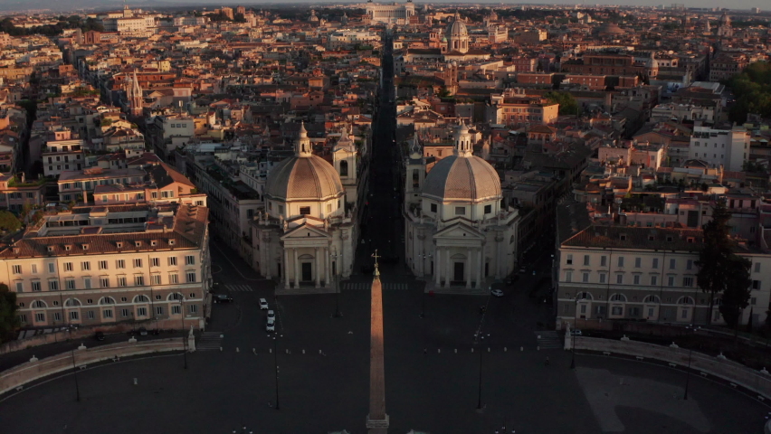 Aerial view of the Piazza del Popolo, famous landmark in Rome, Italy. Drone flying in the sky over old buildings and square in Roma, Italia. Urban view and Italian capital city landscape Royalty-Free Stock Footage #1070346103