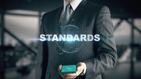 Businessman with Standards hologram concept