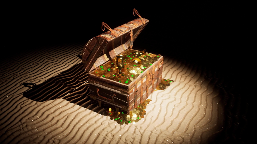 A spotlight shining down onto an open treasure chest on the beach at night, full of gold coins, gold chalices, goblets, emeralds, and gemstones.