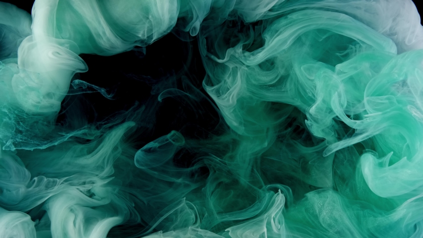 Mint green acrilic liquid glitter texture . Abstract paint background. Motion mixed colorful cloud ink.