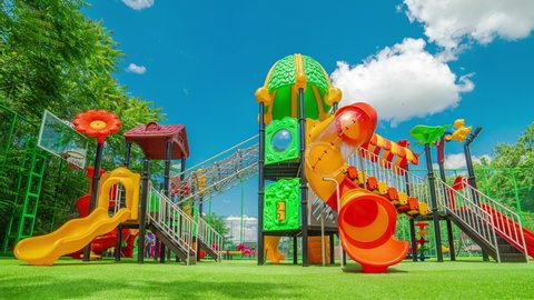 Colorful playground on yard in the park area. Timelapse 4K