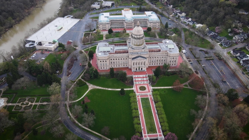 Descending over gardens in front of Kentucky State Capitol Building