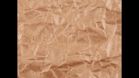 Stop motion of brown crumpled paper texture background