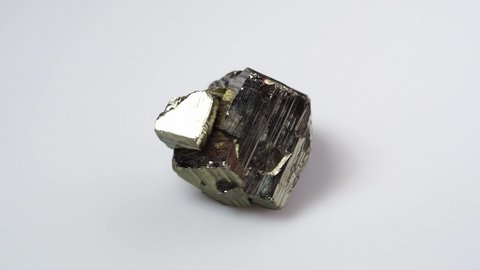 natural pyrite rough gemstone on the background
