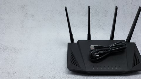 Wireless WIFI Router On Office Table Background. Panning Dolly Slider Shot.
