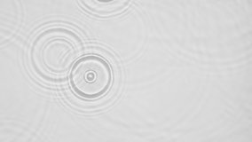 Up close, top view, Slow motion various waves of the water surface hitting the sun's rays, making them sparkle according to different patterns on a gray background video 4K. - Powered by Shutterstock - Get 15% off with code: PIKWIZARD15