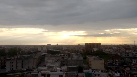4K Time Lapse of Cityscape with Dark Clouds during Sunset, Kharar, Punjab, India