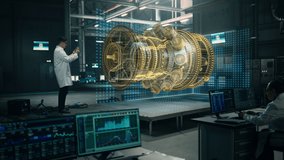 Factory: Engineer Holds Tablet Computer, Designes Engine in Augmented Reality App. Industry 4.0 Concept: Research, Development, Visualization, Digitalization of Green Electric Energy - Powered by Shutterstock - Get 15% off with code: PIKWIZARD15