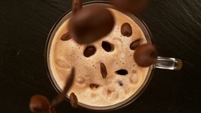 Camera Motion. Super Slow Motion Shot of Falling Coffee Beans into Cup - Powered by Shutterstock - Get 15% off with code: PIKWIZARD15