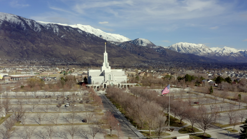 Aerial drone flight ascending in the front of the Mormon Mount Timpanogos Temple in American Fork, Utah