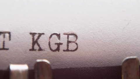 Typing "TOP SECRET KGB" on an old typewriter