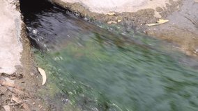 water from pond flowing 120fps slow motion clip
