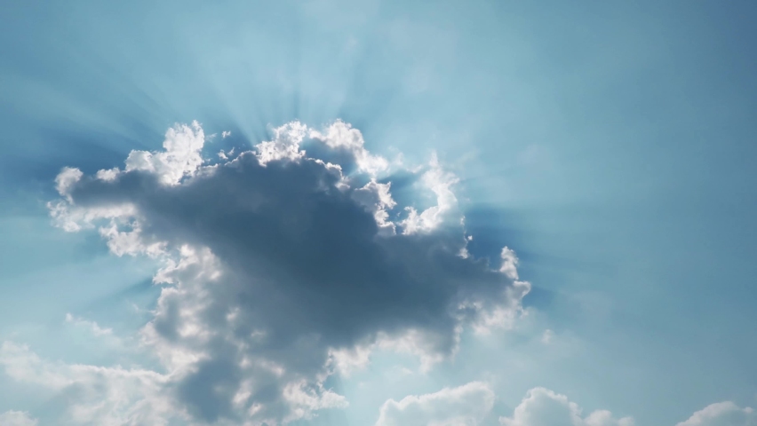 Bright sun light ray flare n sunbeam shining through colorful dark cumulus cloud on Beautiful sunny pastel blue sky in tropical summer sunlight n sunray at daylight sunshine day, 4k b-roll TimeLapse Royalty-Free Stock Footage #1070469916
