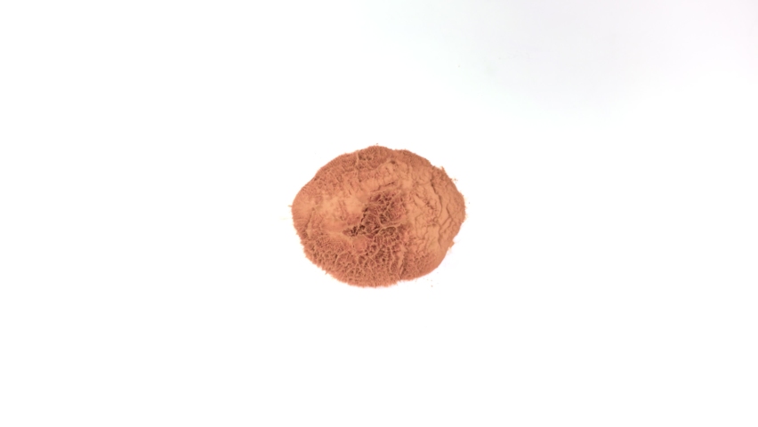 Super Slow Motion Shot of Brown Powder Explosion Isolated on White Background at 1000fps. Royalty-Free Stock Footage #1070499415