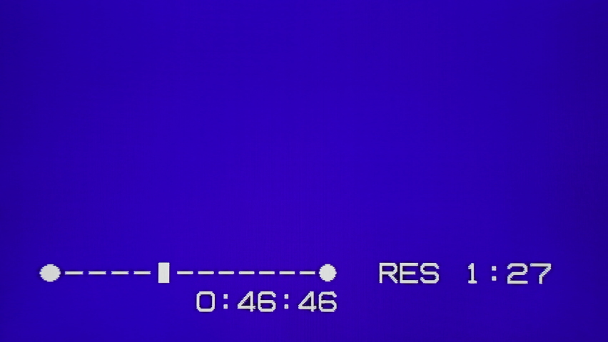 Real Analog VHS blue screen with stop and rew actions Royalty-Free Stock Footage #1070500432