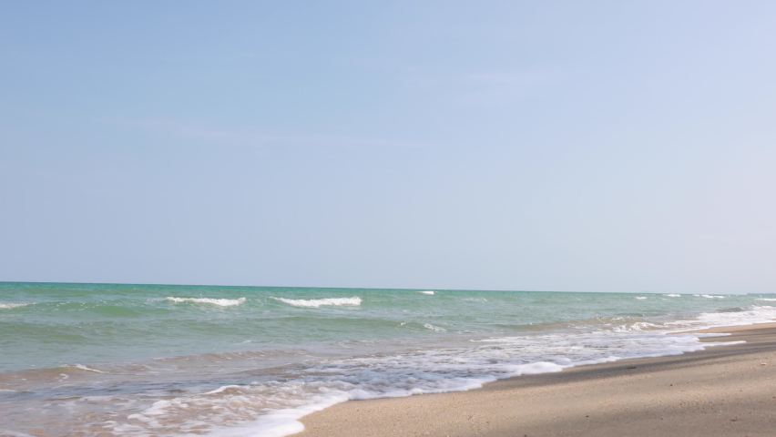 Summer holiday trip concept, Asian kid girl playing running on sea beach