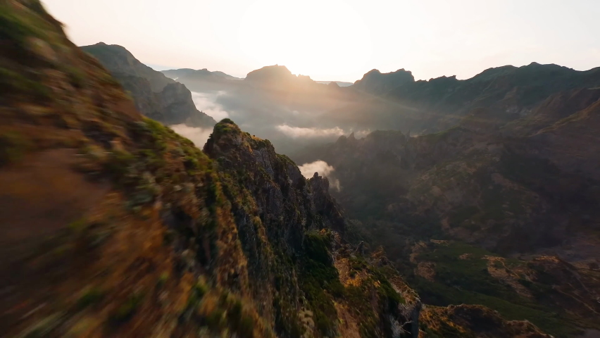 FPV Quad Copter Air Drone Aerial Shot of Forest Mountains and Green Trees. Bird Eye View of 4k Video. Flying Over Madeira Islands