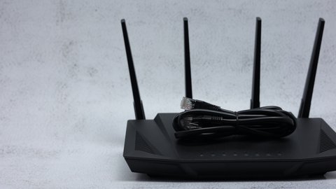 Wireless Router On Office Table Background. Panning Dolly Slider Shot.