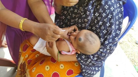 Ghatal, West Bengal, India - April 08, 2021: Pentavalent Vaccination to the infants in India - contains five antigens - diphtheria, pertussis, tetanus, and hepatitis B and Haemophilus influenza type b