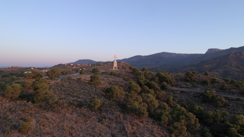 Sculpture of Christ in the middle of the mountain.