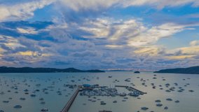 time lapse cloudy in stuning red sky above Chalong pier.
Chalong marina is a center for intense boating activity in Phuket.
4K UHD Stock video for tourism and nautical concepts.