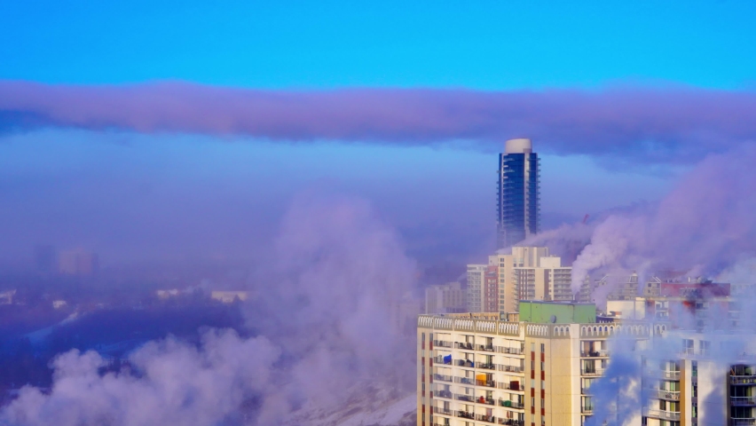 Edmonton Heading into deep freeze estimating at minus 40 to 45 celsius in February 2021 Alberta Canada. This time lapse of the dense residential downtown area of Oliver with West Storm cloud hazing by