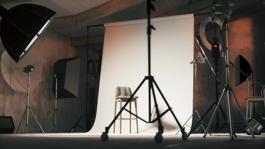 Empty photo studio with chair. Professional photo studio with lights on. 3d visualization Royalty-Free Stock Footage #1070552683