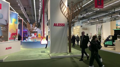 FRANKFURT - CIRCA FEBRUARY, 2020: Footage of people walking and stands at exhibition center called "Messe Frankfurt" at household products fair called "Ambiente" in Frankfurt. Camera moves forward.
