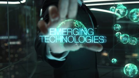 Businessman with Emerging Technologies hologram concept