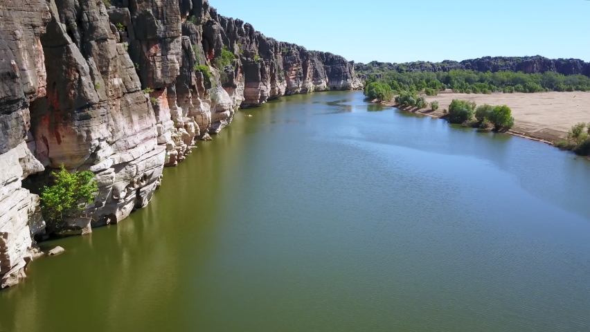 Aerial Shot of Large Cliff Along Wide River Stream, Halls Creek, Western Australia