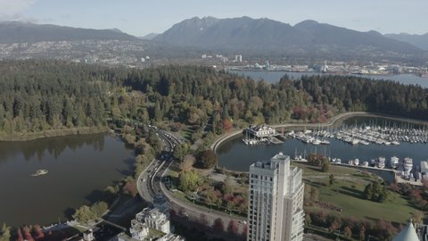 Aerial flying toward Stanley Park in scenic Vancouver, Canada.
