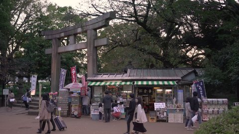 tokyo, japan - october 20 2019: Video of a retro souvenirs store and restaurant called Toshogu Daiichi Shop beside the stone torii gate of Ueno Tosho-gu shrine classed as Important cultural property.
