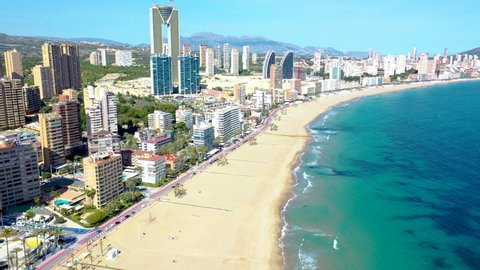 Aerial view of skyscrapers and beach of the touristic city of Benidorm in the Spanish province of Alicante.
