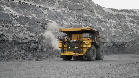 Natalka mine, April 2, 2021. This video shows a Komatsu 730e dump truck loaded with ore and driving through the pit. 