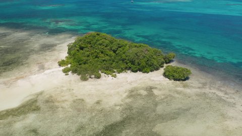 Aerial showing a Island in the shape of a heart on Siargao Island, Philippines.