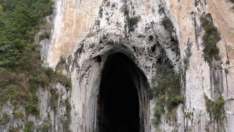 China's Great Arch of Getu, karst mountain rock climbing in Getu Valley, aerial