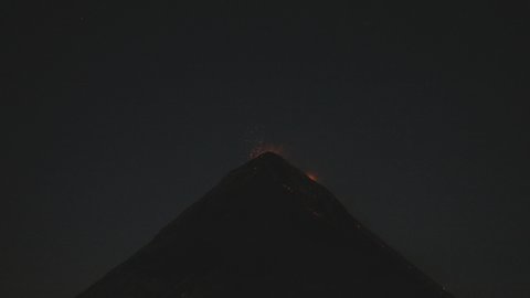 Fuego volcano eruption in the dark during Acatenango hike in Guatemala