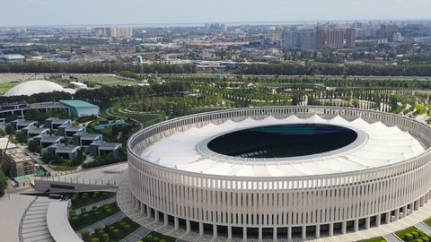 Krasnodar, Russia - August 29, 2020: Krasnodar - football stadium of the eponymous club in the city of Krasnodar. Public Park Krasnodar (Galitsky Park). Summer aerial view, Aerial View, Point of inte