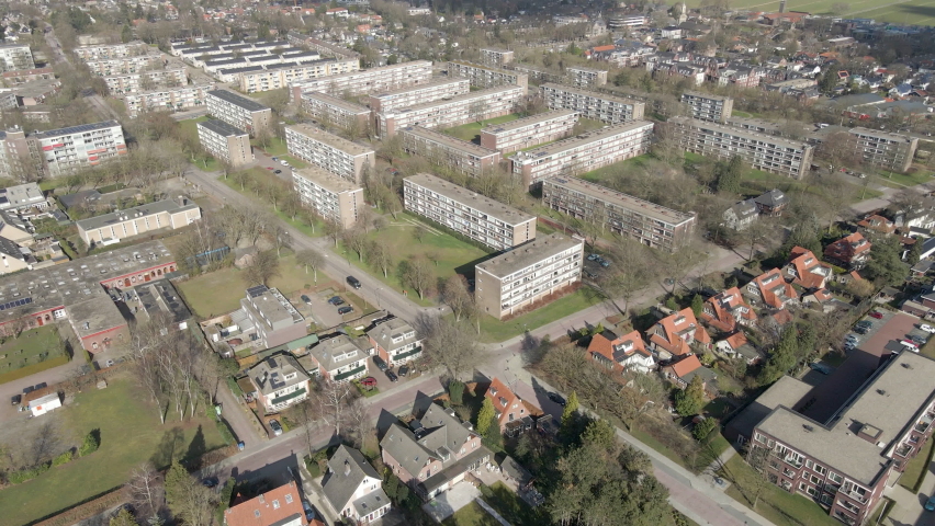 Aerial of apartment buildings in suburban neighbourhood Royalty-Free Stock Footage #1070674546